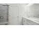 Bathroom showcasing a double vanity with framed mirror and a glass shower at 2053 Skyhawk Dr, York, SC 29745