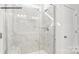 Bathroom with a large marble tile shower and glass doors at 2053 Skyhawk Dr, York, SC 29745