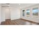Bright bedroom with three large windows and hardwood style floors at 2053 Skyhawk Dr, York, SC 29745