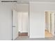 Hallway view of open doorways and light colored walls at 2053 Skyhawk Dr, York, SC 29745