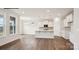 Open-concept living area offering natural light, hardwood floors, and an easy transition to the kitchen at 2053 Skyhawk Dr, York, SC 29745