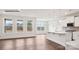 Bright, open living space with large windows, hardwood floors, and seamless flow to the kitchen at 2053 Skyhawk Dr, York, SC 29745