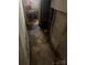 Unfinished basement space with visible damage and debris at 216 Maple St, Statesville, NC 28677