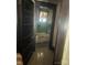 View through doorway to the bathroom with a shower/tub and a toilet at 216 Maple St, Statesville, NC 28677