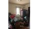 Bedroom filled with furniture, boxes, and belongings that need clearing at 216 Maple St, Statesville, NC 28677