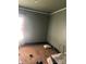 Vintage bedroom with green walls and tan carpet, ready for renovation at 216 Maple St, Statesville, NC 28677