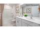 Bright bathroom featuring double sinks, tub, shower, and modern fixtures at 222 Giant Oak Ave, Statesville, NC 28677