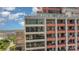 Exterior view of a high-rise residential building featuring modern architecture and balconies at 222 S Caldwell St # 1909, Charlotte, NC 28202