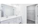Bright bathroom featuring double sink vanity, ample counter space, and convenient access to the walk-in closet at 231 Miramar Dr, York, SC 29745