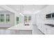 Bright, modern kitchen with white cabinets, a large island, and stainless steel appliances at 231 Miramar Dr, York, SC 29745