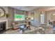 Bright living room offers a fireplace, neutral decor, and comfortable seating at 249 Giant Oak Ave, Statesville, NC 28677