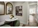 Cozy dining area featuring a marble table, stylish decor, and convenient access to the living spaces at 3055 Finchborough Ct # 218, Charlotte, NC 28269