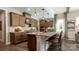 Elegant kitchen with granite island and countertops, stainless steel appliances, and wooden cabinets at 3099 Trace Meadow Ct, York, SC 29745