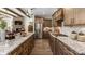 Modern kitchen with stainless steel appliances, wooden cabinets, granite countertops, and hardwood floors at 3099 Trace Meadow Ct, York, SC 29745