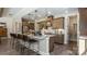 Spacious kitchen with granite island, wooden cabinets, stainless steel appliances, and walk in pantry at 3099 Trace Meadow Ct, York, SC 29745