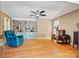 Comfortable living room with hardwood floors, built-in shelving, and a cozy seating area at 312 Rumple St, Troutman, NC 28166