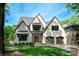 Charming two-story home featuring a symmetrical facade and gray-tone brick at 3524 Lacie Ln, Charlotte, NC 28211