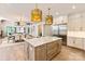 Open kitchen featuring a large island, modern appliances, and an adjacent dining area at 3524 Lacie Ln, Charlotte, NC 28211