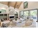 Inviting living area with a fireplace and access to the balcony at 3524 Lacie Ln, Charlotte, NC 28211