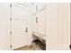 Stylish mudroom features custom cabinets, granite countertop, and convenient integrated dog bowls at 3524 Lacie Ln, Charlotte, NC 28211