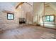 Unfinished room with spray foam insulation, window, and exposed framing at 3524 Lacie Ln, Charlotte, NC 28211