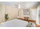 Spacious bedroom featuring hardwood flooring, a ceiling fan, and natural light at 3529 Trent St, Charlotte, NC 28209