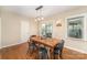 Bright dining room with hardwood floors, an open layout, and a sliding glass door at 3529 Trent St, Charlotte, NC 28209