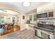 Bright kitchen with a breakfast nook that features modern appliances and lots of natural light at 3529 Trent St, Charlotte, NC 28209