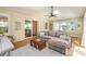 Cozy living room featuring a skylight and sliding glass doors to the backyard at 3529 Trent St, Charlotte, NC 28209