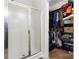 Bathroom showcasing a glass-enclosed shower and organized walk-in closet at 400 Joe Cloninger Rd, Bessemer City, NC 28016