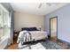 Cozy bedroom featuring hardwood floors, a large window and neutral colors at 400 Joe Cloninger Rd, Bessemer City, NC 28016