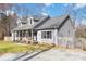 Beautifully kept gray home with a spacious yard at 400 Joe Cloninger Rd, Bessemer City, NC 28016