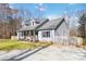 Beautifully kept gray home with a spacious yard at 400 Joe Cloninger Rd, Bessemer City, NC 28016