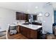 Modern kitchen with quartz countertops, dark cabinetry, stainless steel appliances, and center island at 400 Joe Cloninger Rd, Bessemer City, NC 28016