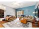 Inviting living room featuring comfortable seating, hardwood floors, and a bright atmosphere at 400 Joe Cloninger Rd, Bessemer City, NC 28016
