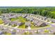 A high angle shows the neighborhood's design with lush green spaces and a variety of architectural styles at 4069 Havenport Cir, Fort Mill, SC 29708