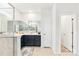 Stylish bathroom with double sinks, dark cabinets, and an oversized mirror at 4069 Havenport Cir, Fort Mill, SC 29708