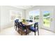 Bright dining area with modern table set, natural light and view of backyard at 4069 Havenport Cir, Fort Mill, SC 29708