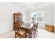 Traditional dining room with antique hutch, wooden table set, and ample space for entertaining at 4069 Havenport Cir, Fort Mill, SC 29708