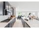 Modern kitchen featuring a gas range, subway tile backsplash, and an island with sink at 4069 Havenport Cir, Fort Mill, SC 29708