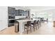 Open kitchen with a large island, stainless appliances, and sleek, dark cabinetry at 4069 Havenport Cir, Fort Mill, SC 29708