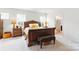 Inviting main bedroom features a large bed, wood furniture, and ensuite bathroom access at 4069 Havenport Cir, Fort Mill, SC 29708