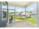 Inviting screened porch with view of backyard and neighboring homes at 4069 Havenport Cir, Fort Mill, SC 29708