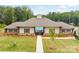 A beautifully landscaped clubhouse with a pathway leading to the pool, promising leisure and recreation at 4069 Havenport Cir, Tega Cay, SC 29708