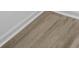 Close up of the beautiful wood-look laminate flooring at 4101 New Castle Ln, Monroe, NC 28110