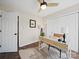 Comfortable home office with a stylish desk, ample lighting, and modern decor at 4101 New Castle Ln, Monroe, NC 28110