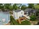 Aerial view of the property featuring a deck, fenced yard, and landscaping at 414 King St, Waxhaw, NC 28173