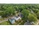 A high angle view showcasing the home nestled among lush greenery and neighboring houses at 414 King St, Waxhaw, NC 28173