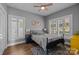 Serene bedroom with natural light, featuring a comfortable bed and stylish decor at 414 King St, Waxhaw, NC 28173