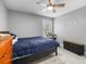 Bedroom featuring a ceiling fan, neutral walls, and a large window at 414 King St, Waxhaw, NC 28173